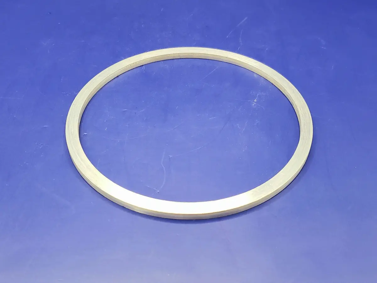 77A488: Shim  4.62"Id X 5.113"Od Alum  Laminated 1