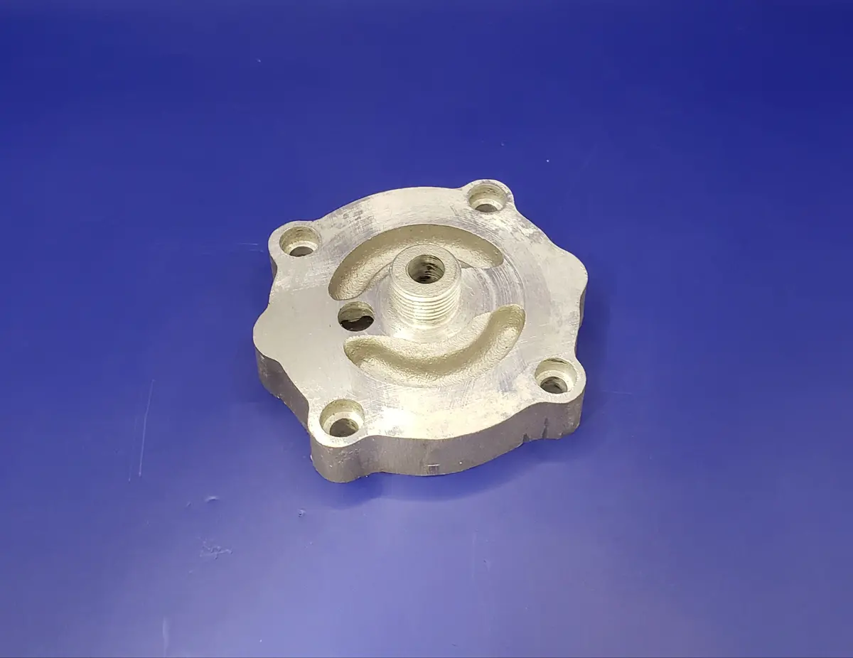 P10957c: Cover, Oil Pump 1