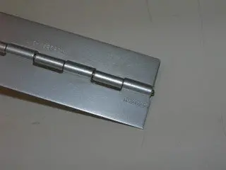 Hinge, Piano - 1 1/4" Width - Continuous Roll - .040 Thick 1